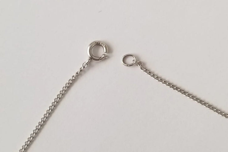 Collier Collier Art Déco en or blanc 18k et diamants 58 Facettes