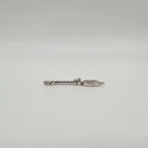 Pendentif Pendentif clef or blanc 18 carats serti de diamants 58 Facettes