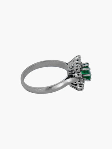 Bague 56 Bague or blanc, diamants et émeraude 58 Facettes