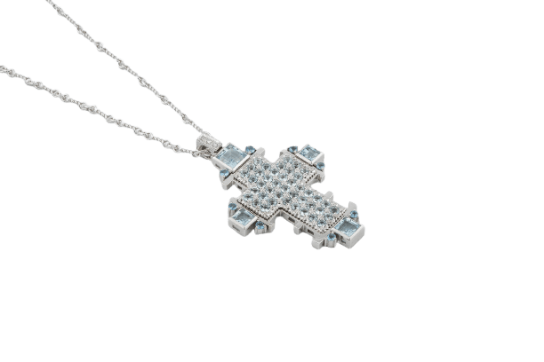 Collier Oro Bianco Collier croix en or blanc 19 kt avec diamants et aigue-marine 58 Facettes COL245