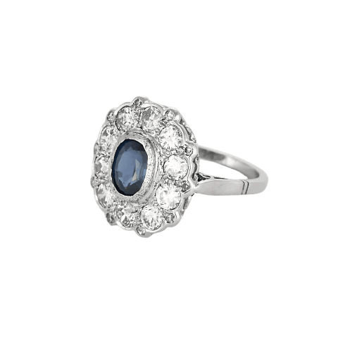 Bague 56 Bague Marguerite en platine et saphir ovale, entourage de diamants 58 Facettes LJ 24- 178
