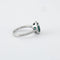 Bague 50 Bague en or blanc, émeraude & diamants 58 Facettes
