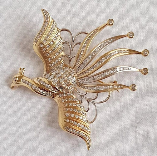 Broche Broche OISEAU DE PARADIS or jaune diamants 58 Facettes R 1137  MKEE