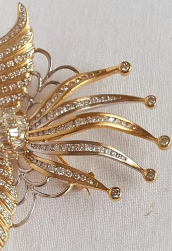 Broche Broche OISEAU DE PARADIS or jaune diamants 58 Facettes R 1137  MKEE