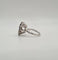 Bague 53 Bague or blanc, saphir, diamants baguettes et diamants ovales 58 Facettes