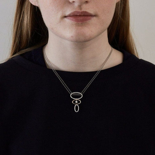 Collier Dalumi - Collier pendentif anneaux en or jaune, or gris et diamants 58 Facettes ALGU29