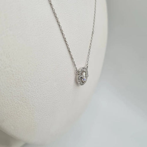 Collier Collier or blanc 18 carats sertie d’un diamant rond et halo diamants naturels 58 Facettes