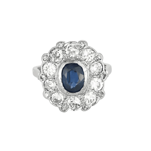 Bague 56 Bague Marguerite en platine et saphir ovale, entourage de diamants 58 Facettes LJ 24- 178