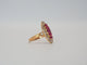 Bague 52 Bague Marquise or jaune, diamants, rubis 58 Facettes 4574