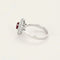 Bague 51.5 Bague marguerite en or gris 18k, rubis ovale et diamants 58 Facettes BA214