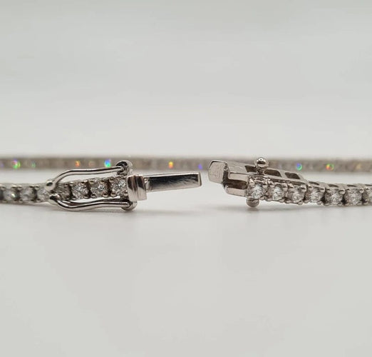 Bracelet Bracelet tennis or blanc 18 carats serti de diamants 58 Facettes