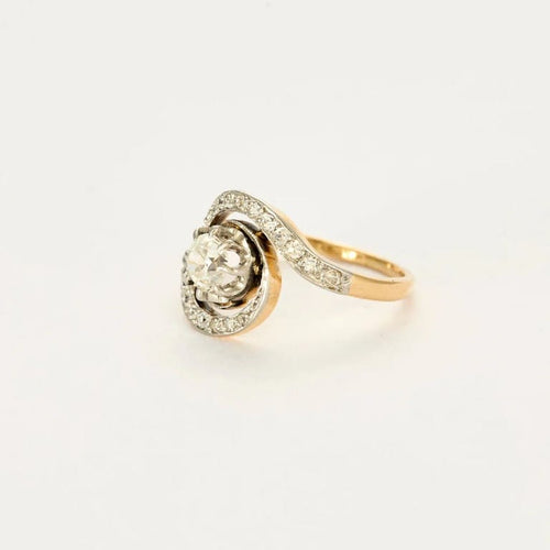 Bague 51 Bague Tourbillon en or jaune et gris 18k et diamants 58 Facettes LJ6