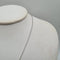 Collier Collier or blanc 18 carats sertie d’un diamant rond et halo diamants naturels 58 Facettes