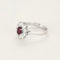 Bague 51.5 Bague marguerite en or gris 18k, rubis ovale et diamants 58 Facettes BA214