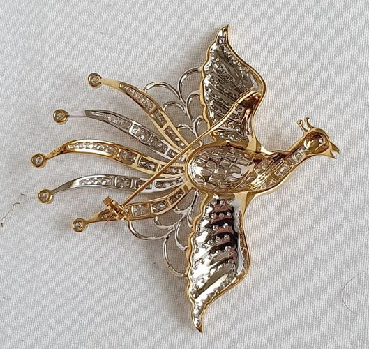 Broche Broche OISEAU DE PARADIS or jaune diamants 58 Facettes R 1137  MKEE