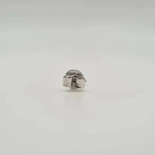 Boucles d'oreilles Boucle d’oreille puce or blanc 18 carat sertie d’un diamant navette 58 Facettes