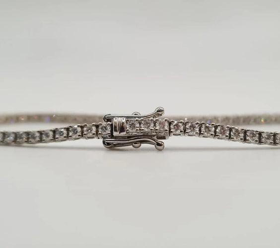 Bracelet Bracelet tennis or blanc 18 carats serti de diamants 58 Facettes