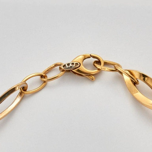 Collier Collier à maillons losangiques en or jaune et or gris 18k 58 Facettes ALGU24