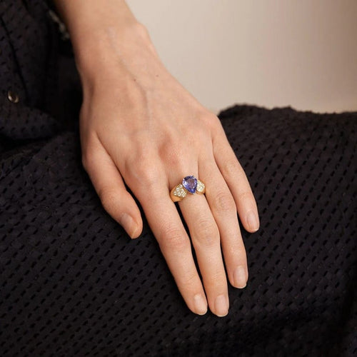 Bague 54 Bague en Or jaune, diamants, tanzanite 58 Facettes