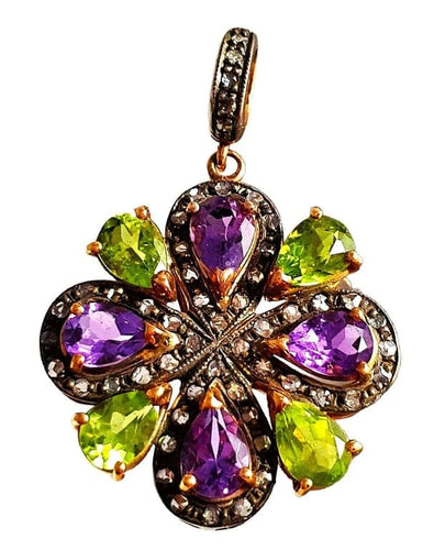 Pendentif Pendentif or et argent avec améthystes, péridots et diamants 58 Facettes R 650  Rie