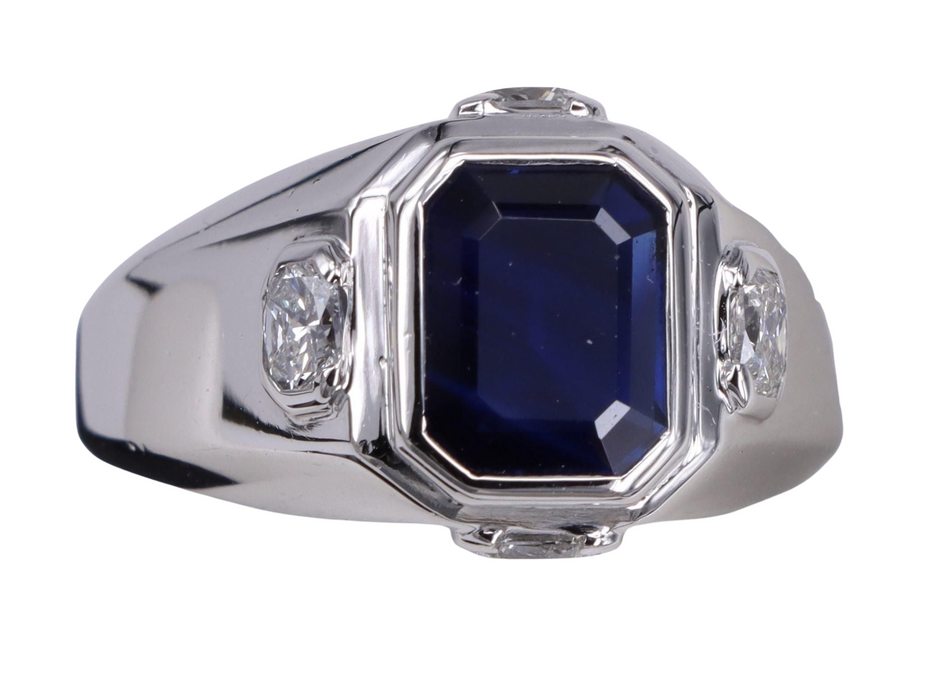Emerald cut sapphire and Diamond white gold ring