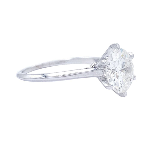 Bague 52 Bague solitaire en or blanc et platine sertie d’un diamant 58 Facettes 32492