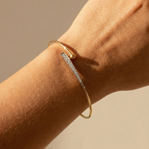 Narukvica Narukvica od žutog zlata 18 karata sa 12 dijamanata 58 Facettes