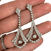 Boucles d'oreilles Boucles d'oreilles de style Art Déco en platine avec diamants. 58 Facettes