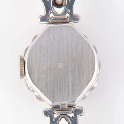 Montre Montre or blanc et diamants 58 Facettes 1