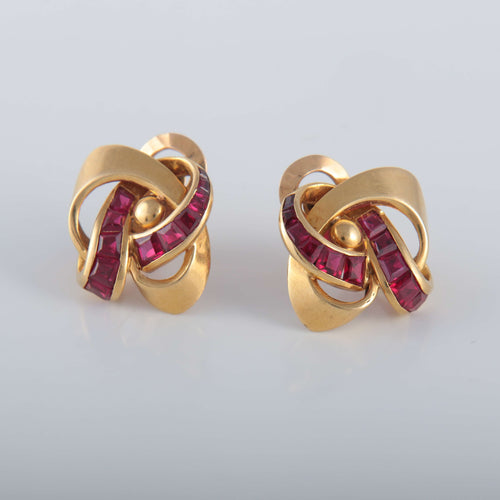 Boucles d'oreilles Boucles d'oreilles entrelacées Rubis synthétiques 58 Facettes 1