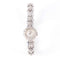 Montre Montre or blanc et diamants 58 Facettes 1