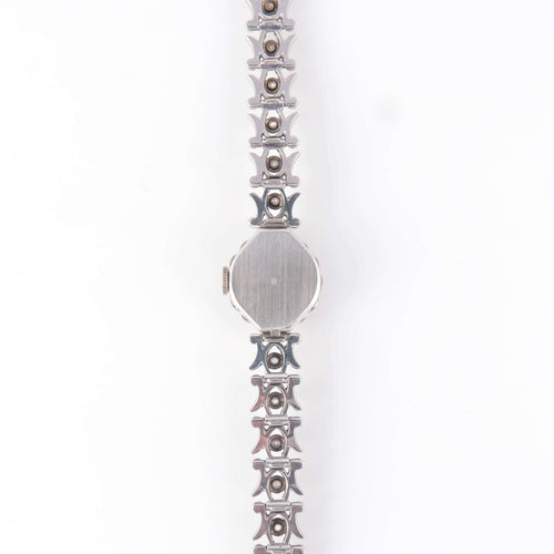 Montre Montre or blanc et diamants 58 Facettes 1