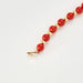 Collier Collier or jaune billes de corail 58 Facettes DV0362-3