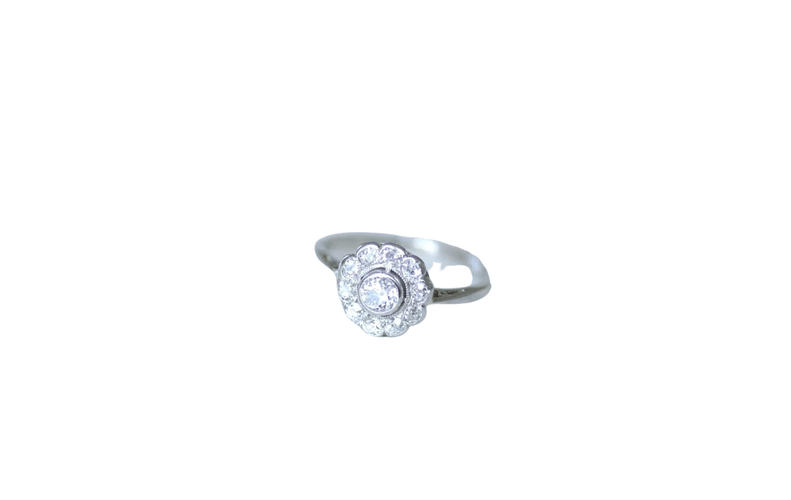 Bague marguerite platine et diamants 58 Facettes