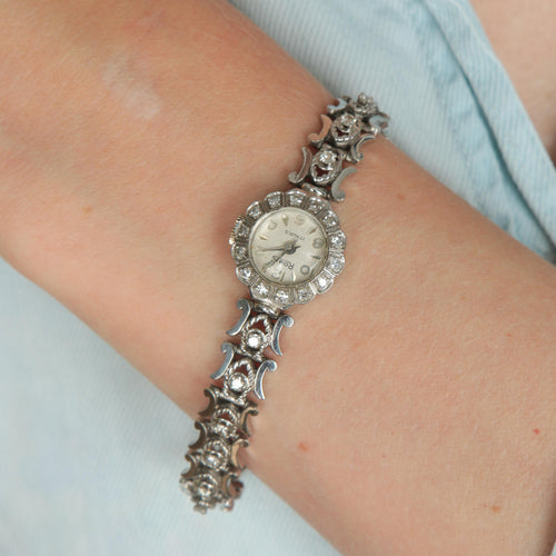 Montre Montre or blanc et diamants 58 Facettes 1