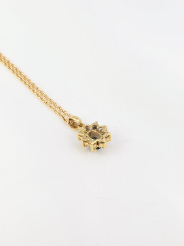 Pendentif Pendentif vintage marguerite en or, saphir et diamants 58 Facettes 52
