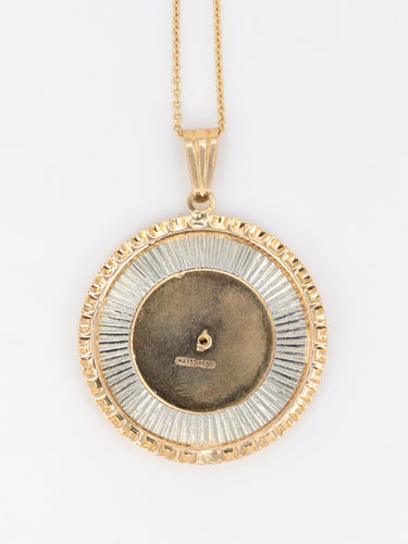 Pendentif Médaille vintage en or jaune et blanc 58 Facettes 672