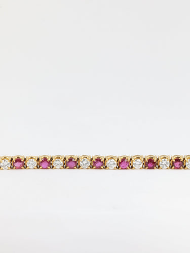 Bracelet Bracelet tennis vintage en or, rubis et diamants 58 Facettes 432