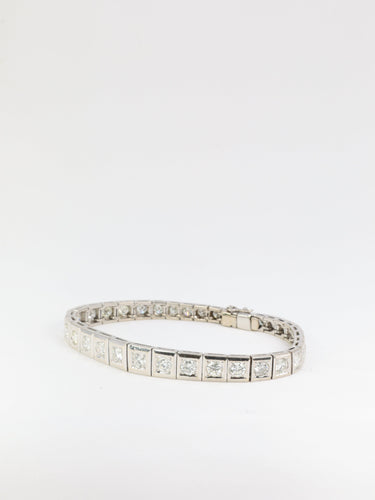 Bracelet Bracelet rivière articulé en or, platine et diamants 58 Facettes 389