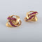 Boucles d'oreilles Boucles d'oreilles entrelacées Rubis synthétiques 58 Facettes 1