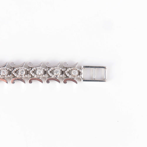 Montre Montre or blanc et diamants 58 Facettes 1