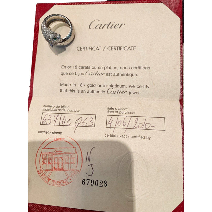Bague 53 Bague Cartier "Panthère de Cartier" en or blanc, diamants, émeraudes et onyx. 58 Facettes 29075-1