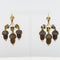 Boucles d'oreilles Boucles d'oreilles anciennes feuilles et glands cheveux 58 Facettes 19-072