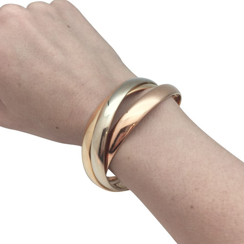 Bracelet Bracelet Cartier "Trinity" en or de trois tons. 58 Facettes 30299