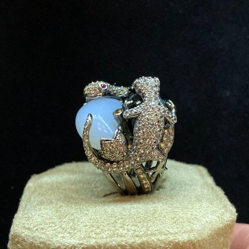 Bague Bague or foncé calcédoine, onyx et diamant salamandre 58 Facettes CEY5