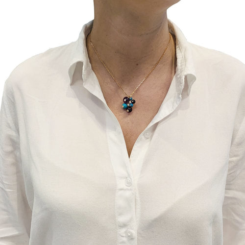 Collier Collier Cartier "Délices de Goa" en or jaune, améthystes, turquoises et diamants. 58 Facettes 30017