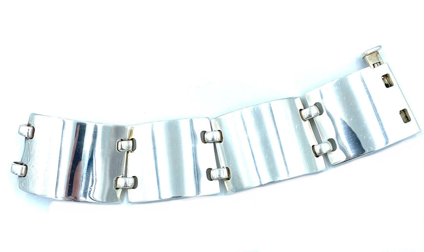 Bracelet HERMÈS. Bracelet manchette articulée argent 58 Facettes