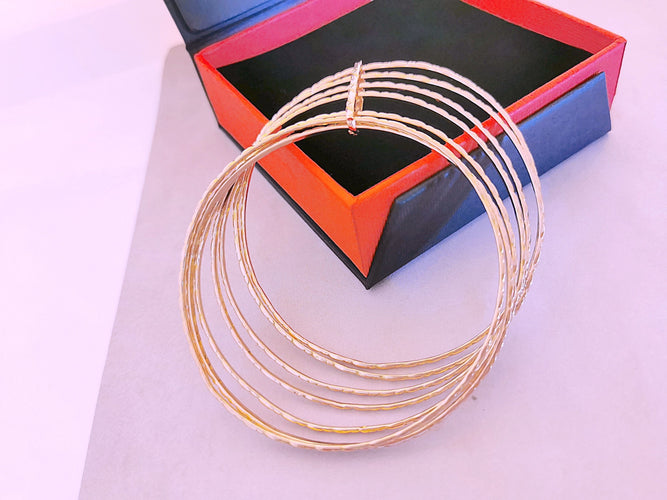 Bracelet Bracelet Semainier Joncs ciselés Or Rose 58 Facettes AA 1477