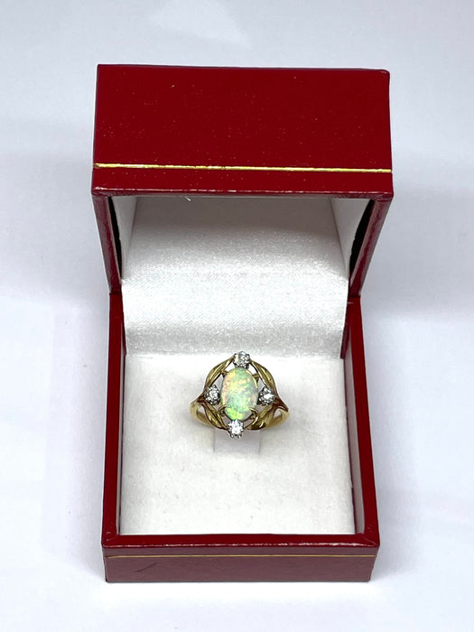 Bague Bague opale et diamants monture en or jaune 18 carats 58 Facettes