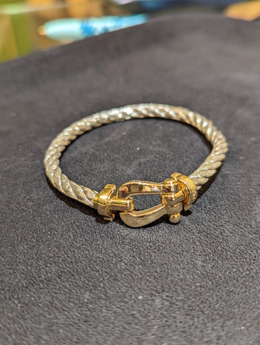 Bracelet Bracelet FRED Force 10 or et acier 58 Facettes